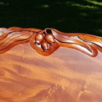 Gum leaf carving of bench in red cedar